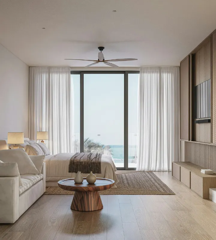 Chambre avec un lit canapé et brasseur d'air